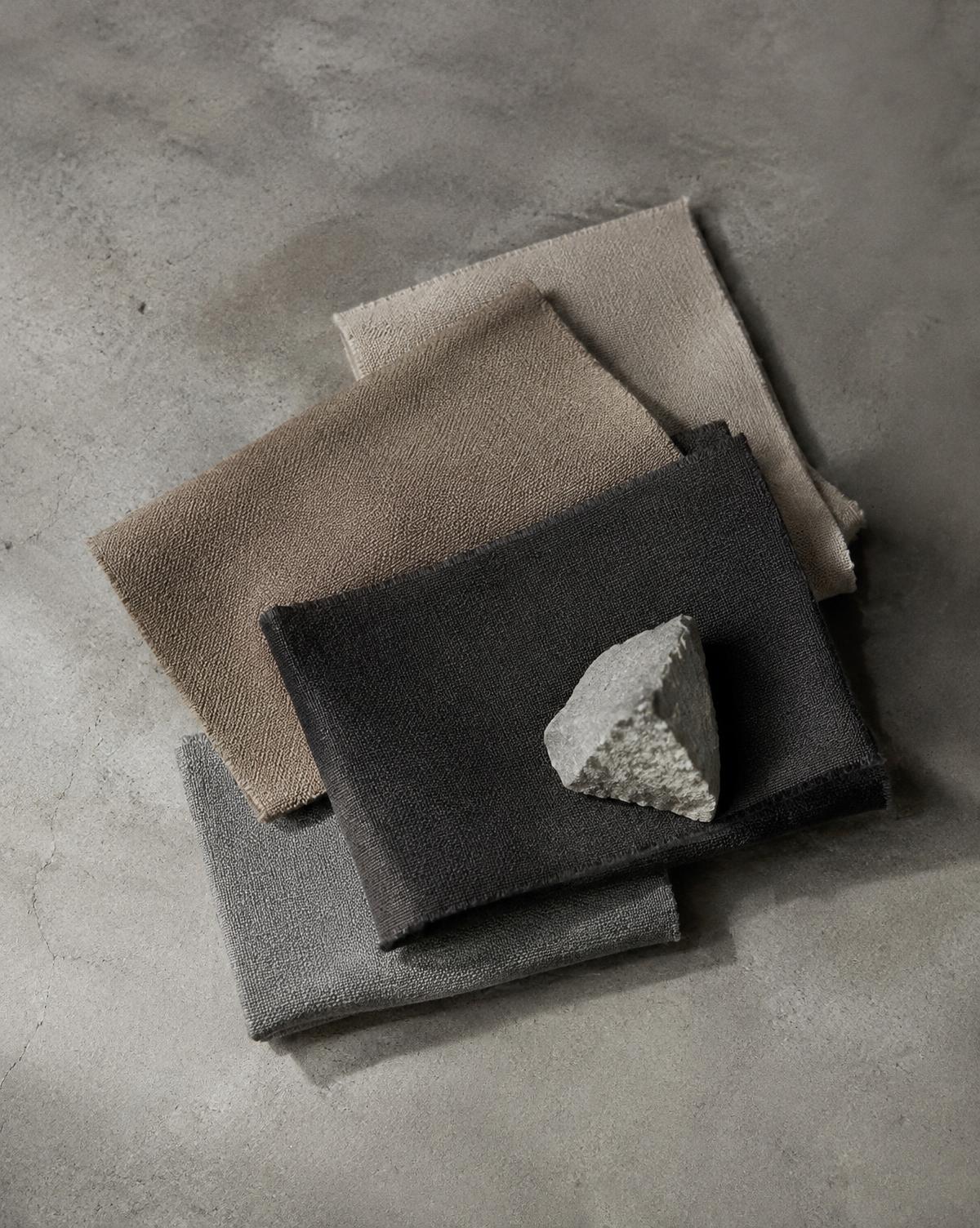 Fabric swatches in stone, sand, charcoal and grey